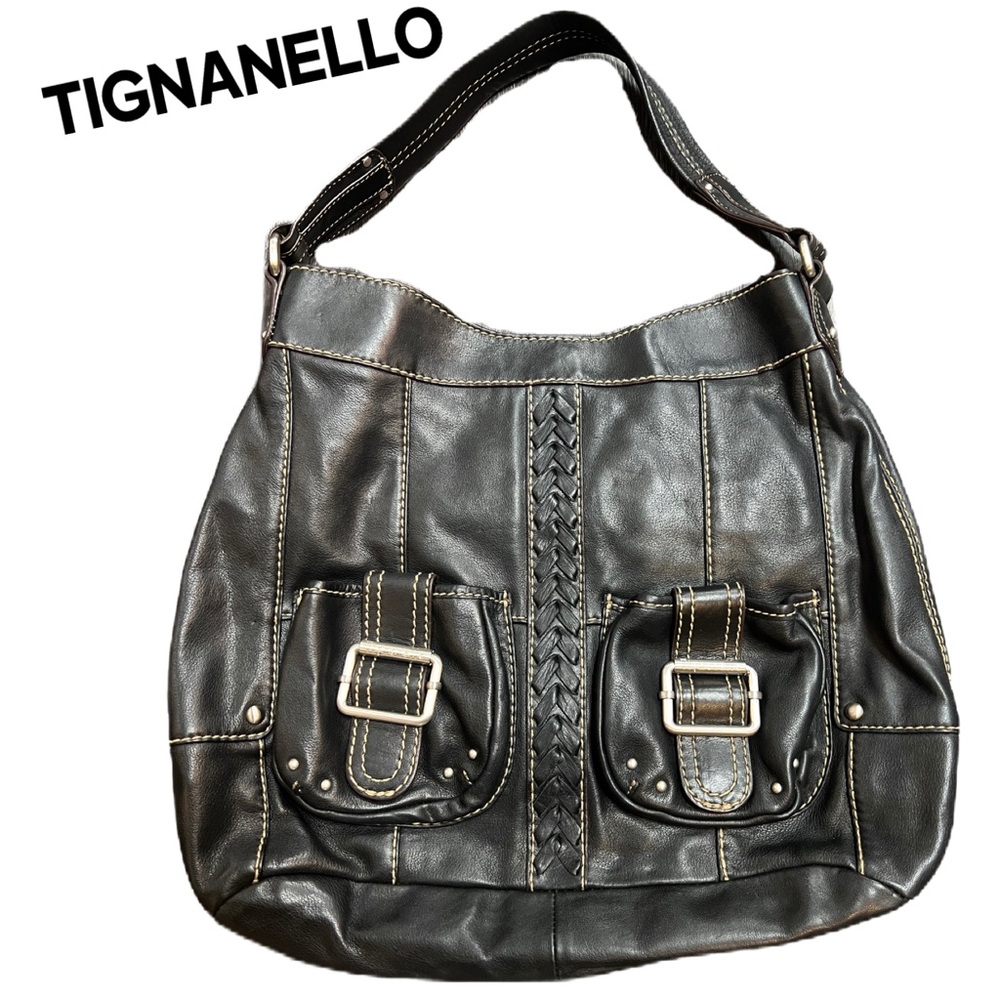 Tignanello Leather hobo shoulder bag with buckle pockets and braided detailing.